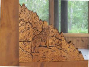 hand carved cedar screen door built by john huisman, ely, mn