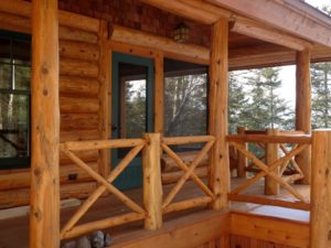 solid cedar screen door, green, built by john huisman, screen porch, log railing