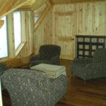 loft sitting area, pine walls, hickory floors