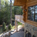 Lakeside deck, log railing