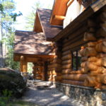 huge cedar logs, stone landscaping