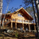 Cedar Log Lake Cabin set in hill side