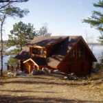 Cedar Log Lake Cabin set in hill side