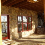 Stone work on basement walkout, wineberry windows