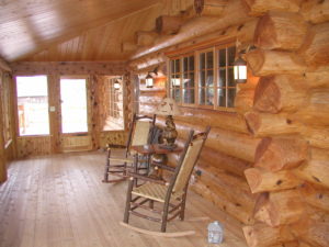 Cedar log home screen porch