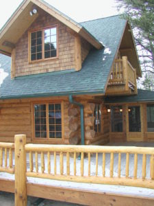 Cedar Logs and railing, dormers and screen porch